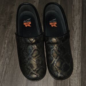 Dansko Black and Gold Patterned Clogs
